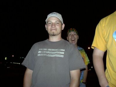 dedhed and kweejee over his shoulder.