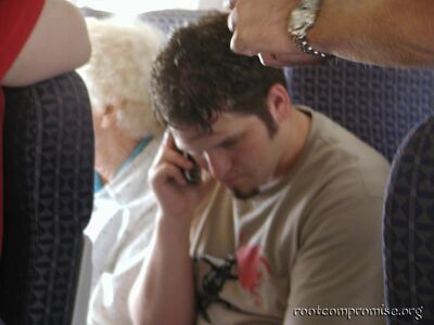 dedhed calling his womang to break the news.