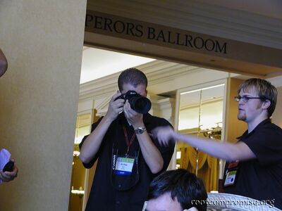 Checking out Fred's camera.