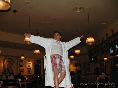 This guy jumped up on a table and started dancing when asked about his robe.