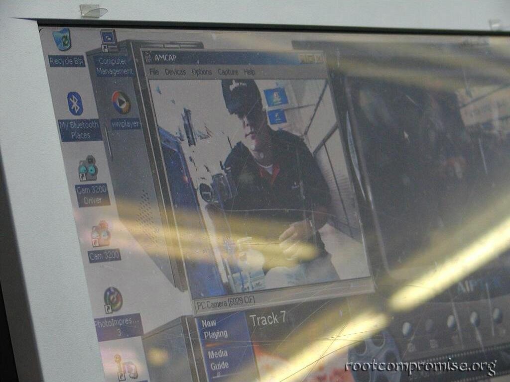 I took a picture of me in a screen while looking at the camera a few machines away.